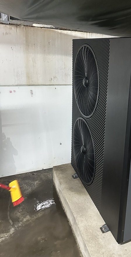 Installed iHEAT R290 heat pump running on its plinth